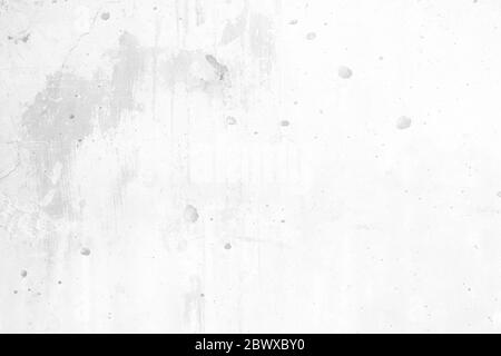 White Raw Beton Wand Textur Hintergrund mit Malfarben, geeignet für Präsentation, Mockup, Hintergrund und Web-Vorlagen mit Platz für Text. Stockfoto