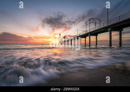 Sonnenuntergang am Brighton Pier, Adelaide, South Australia Stockfoto