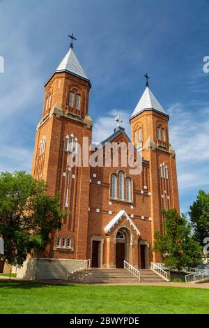 Die Pfarrkirche Notre Dame d’Auvergne ist ein städtisches Kulturerbe in der Stadt Ponteix, Saskatchewan, Kanada. Stockfoto