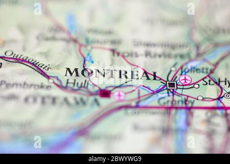 Geringe Tiefenschärfe Fokus auf geographische Kartenposition von Montreal Kanada Amerika Kontinent auf Atlas Stockfoto