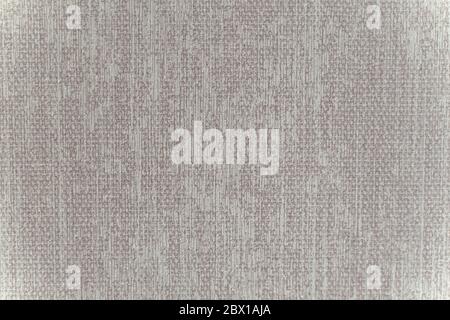 Textur aus rauem beigefarbenem Stoff. Grunge Hintergrund Stockfoto