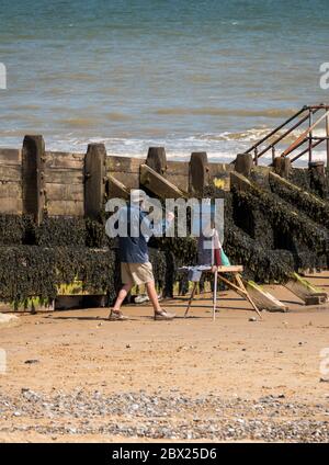 Gemälde lokaler Künstler am Cromer Beach Stockfoto