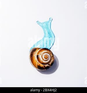 Kreatives Image von Kosmetik mit Schnecke Konzept Gesichts Körperpflege mit Schnecke Schleim Stockfoto