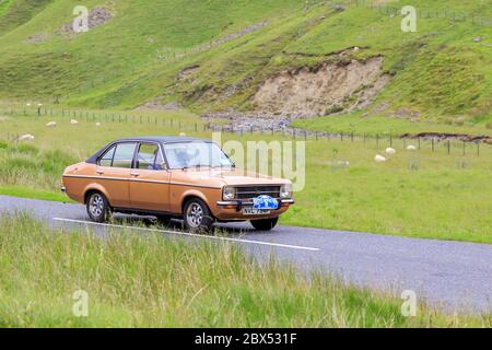 MOFFAT, SCHOTTLAND - 29. JUNI 2019: 1979 Ford Escort MK2 1.3 Ghia Auto in einer Oldtimer-Rallye auf dem Weg nach Moffat, Dumfries und Galloway Stockfoto