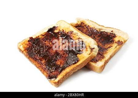 Vegemite auf Toast, eine australische Ikone. Isoliert auf Weiß. Stockfoto