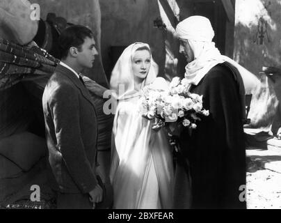CHARLES BOYER MARLENE DIETRICH und BASIL RATHBONE im GARTEN ALLAHS 1936 Regisseur RICHARD BOLESLAWSKI Roman Robert Hichens Musik Max Steiner Produzent David O. Selznick Selznick International Pictures / United Artists Stockfoto