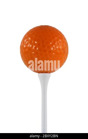 Isolierte orange Golf Ball auf einem weißen T-Stück Stockfoto