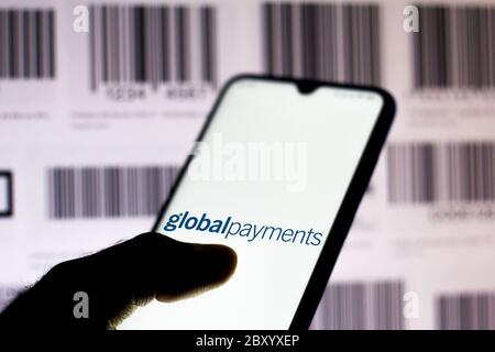 In dieser Abbildung wird das Logo von Global Payments auf einem Smartphone angezeigt. Stockfoto