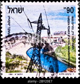 Briefmarke zeigt Yarden Power Station in Israel Stockfoto