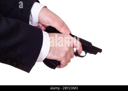 Hände laden Pistole Stockfoto