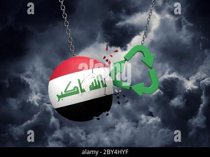 Green Recycling Symbol Absturz in einen Irak Flagge Ball. 3D-Rendering Stockfoto