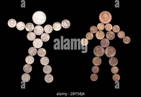 Mann und Frau Silhouette von Münzen Stockfoto