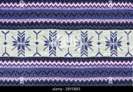 gestrickte blauer Hintergrund mit einem Muster Stockfoto