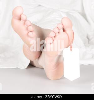Entspannte Leiche mit Toe-tag Stockfoto