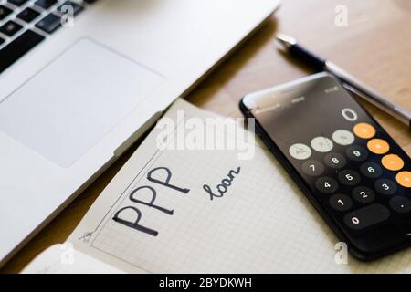 PPP Darlehen, Paycheck Schutz-Programm. Hilfe für Kleinunternehmen während der covid-19 Stockfoto