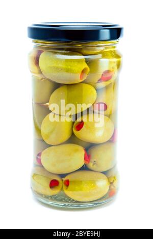 Glas mit verzinnten Oliven Stockfoto