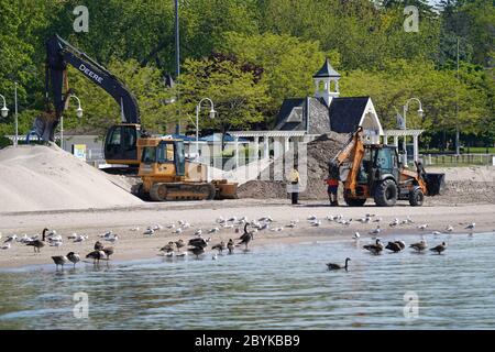 Baggern der Hafen für Segelboote in Cobourg Hafen Stockfoto