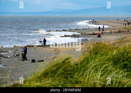 Angeln vom Rossall Beach Stockfoto