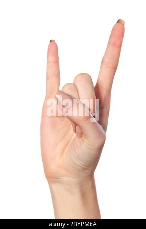 Die Hand einer Frau er die Rock And Roll-Zeichen Stockfoto