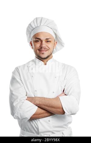 Happy Chef in weißer Uniform isoliert Stockfoto