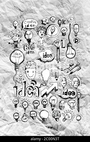 Handsymbol Doodle Business Bühnenbild Idee auf zerknittertes Papier Stockfoto