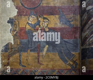 David und Goliath, die in dem vor 1123 fertiggestellten mittelalterlichen romanischen Fresko aus der Kirche Santa Maria de Taüll in der Gegend von Vall de Boí in Alta Ribagorça in Katalonien, Spanien, dargestellt sind, das jetzt im Nationalen Kunstmuseum von Katalonien (Museu Nacional d'Art de Catalunya) in Barcelona ausgestellt ist, Katalonien, Spanien. Stockfoto
