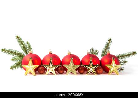 Rote Weihnachtskugeln und Tannenzweig Stockfoto