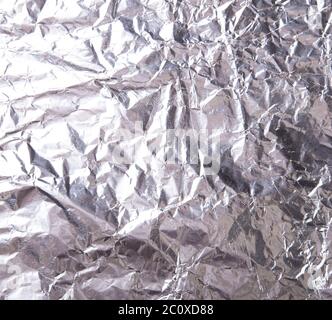 Silbernes Blatt Folie Hintergrund mit Stockfoto