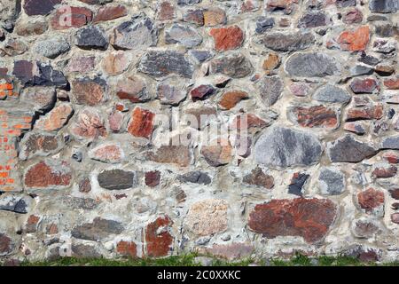 Alte Mauer von Steinen Hintergrund Stockfoto