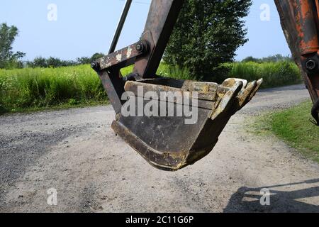 Nahaufnahme des Baggerschaufels Nahaufnahme des Baggerschaufels Stockfoto