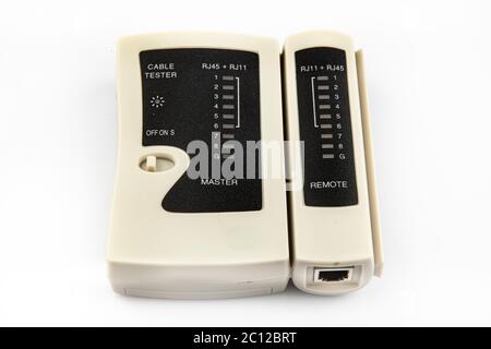 Kabeltester. Netzwerk LAN USB Kabeltester Multi-Modular LAN USB Netzwerk RJ45 Cat5 RJ11 isoliert auf weißem Hintergrund. Stockfoto