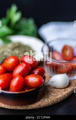 Tomate Cherry, perejil y ajo Stockfoto