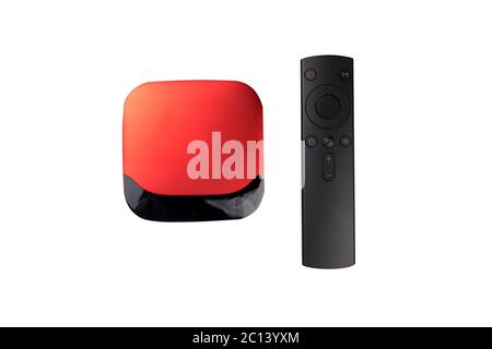 Isolierte smart tv Box und Fernbedienung auf Weiß Stockfoto