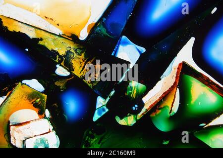 Farbige Flüssigkeiten in Flüssigkeit gemischt Schaffung bunte abstrakte Malerei Stockfoto