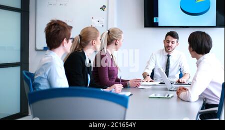 Gruppe von Geschäftsreisenden auf der Sitzung Stockfoto