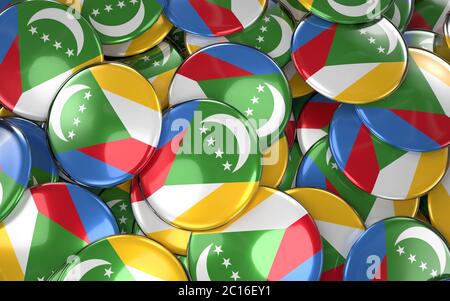 Komoren Abzeichen Background - Stapel von Komoren Flagge Tasten. Stockfoto