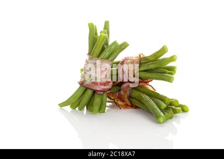 Grüne Bohnen mit Speck Stockfoto