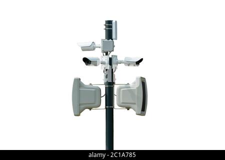 Viele Überwachungskameras und ein Megaphon, das an einem Mast hängt, isolieren Stockfoto