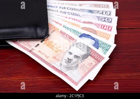 Kubanische Pesos in der schwarzen Mappe Stockfoto