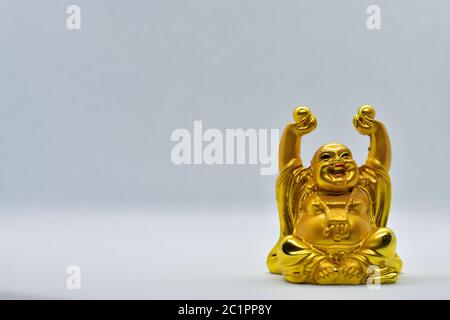 Der lachende Buddha ist ein Symbol für Glück, Zufriedenheit und Wohlstand. Er wird auf Chinesisch ‘Budai’ genannt. Stockfoto