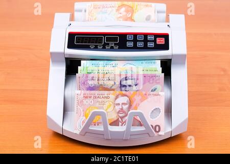 Alte Neuseeland Dollar in eine zählmaschine Stockfoto