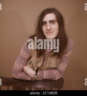 George Walker, Musiker der deutschen Krautrock Band 'George Walker & Company', bei einem Fotoshooting in Hamburg, Deutschland um 1970. Der deutsche Musiker George Walker von der Krautrock-Band 'George Walker & Company' während eines Fotoshootings in Hamburg, Deutschland um 1970. Stockfoto