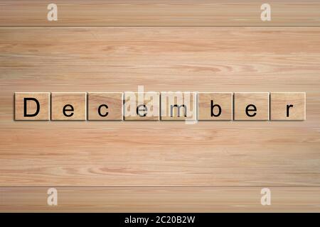 Dezember Wort auf Holzblock geschrieben. Nachrichtentext auf Holztisch für Hintergrundgestaltung. Stockfoto