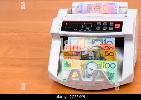 Australische Dollar in eine zählmaschine Stockfoto