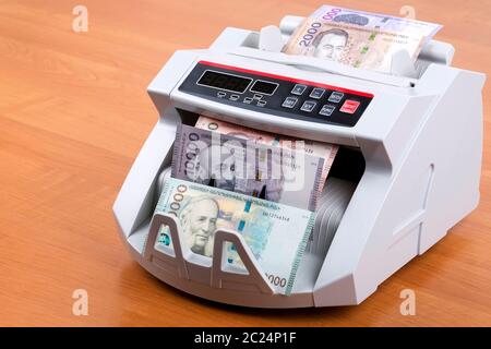 Armenische Dram in eine zählmaschine Stockfoto