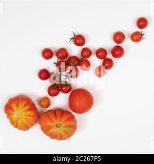 Einige Arten von Tomaten auf eine weiße Fläche Stockfoto