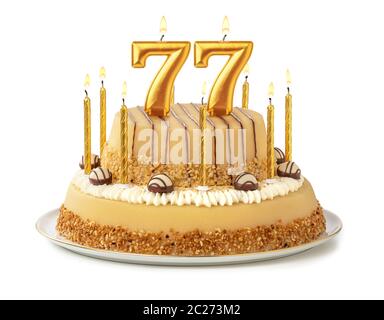 Festliche Kuchen mit goldenen Kerzen - Nummer 77 Stockfoto