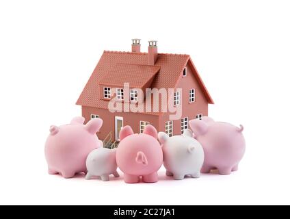 Gruppe von Piggy banks am braunen Haus suchen Stockfoto