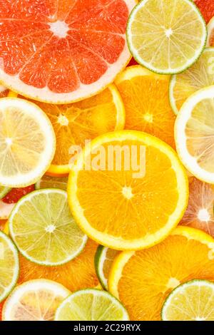 Zitrusfrüchte Sammlung essen Hintergrund Orangen Zitronen Limonen Hochformat Grapefruit frisches Obst Hintergründe Stockfoto