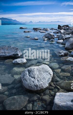 Ein bewölktes Morgenbild über den Pukaki See in Richtung Mount Cook in Neuseeland. Stockfoto